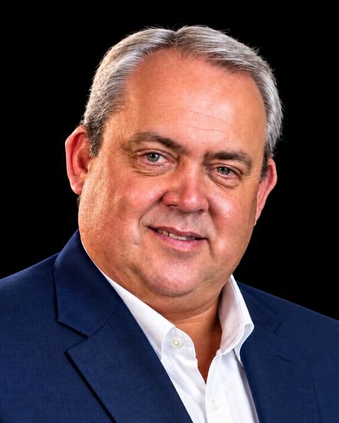 Hon. Justin Tkatchenko